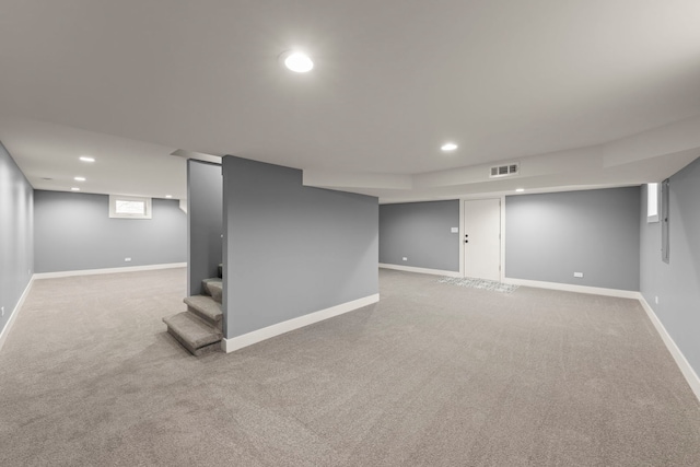 basement with light carpet