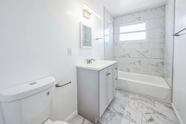 full bathroom with vanity, toilet, and tiled shower / bath