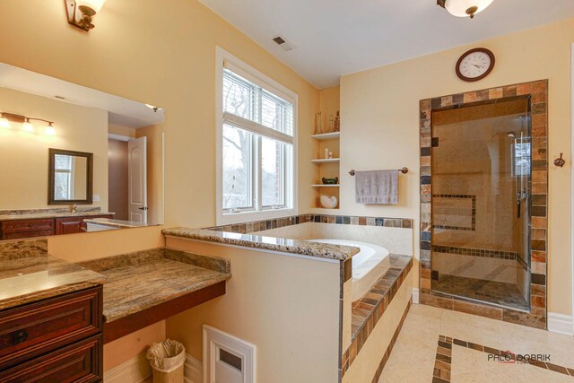 kitchen with open shelves, visible vents, and light tile patterned floors