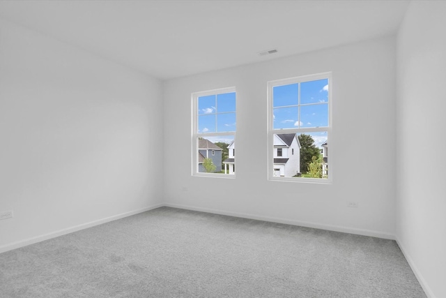 empty room featuring carpet