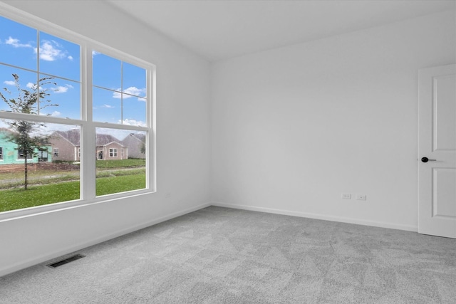 view of carpeted spare room