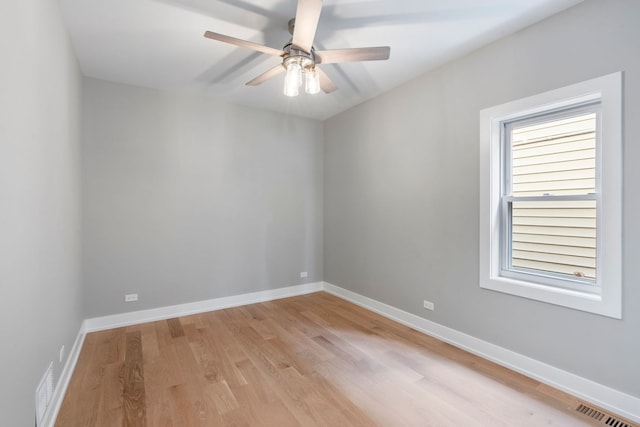 unfurnished room featuring ceiling fan and light hardwood / wood-style flooring