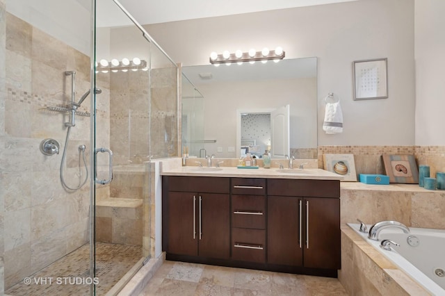 bathroom featuring vanity and plus walk in shower