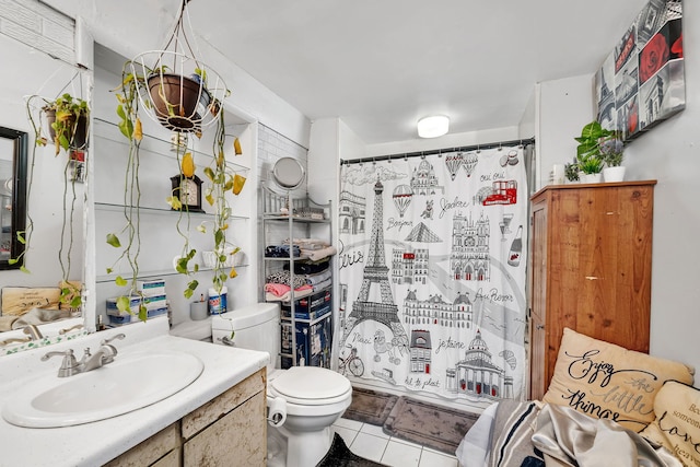 full bathroom with tile patterned floors, vanity, toilet, and shower / bath combo with shower curtain