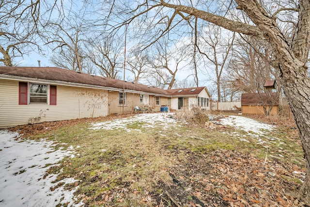 view of snow covered property