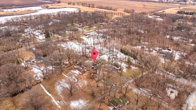 snowy aerial view featuring a rural view