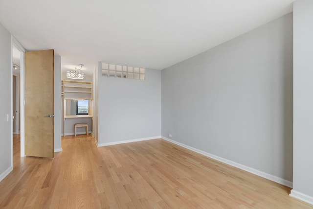 empty room with light wood-type flooring