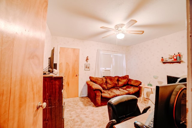 carpeted living room featuring ceiling fan