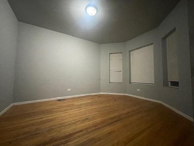 empty room featuring hardwood / wood-style floors