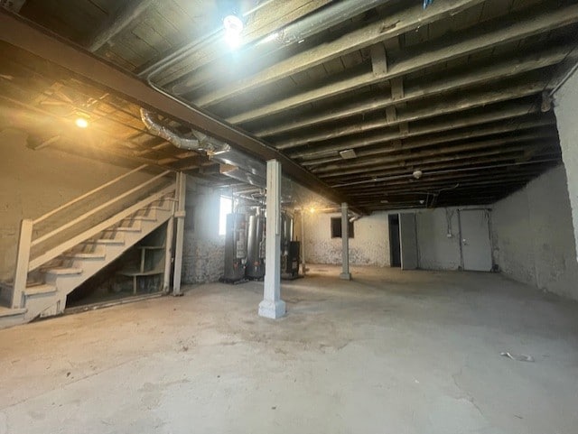 basement with heating unit and water heater