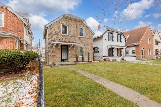 front facade with a front yard