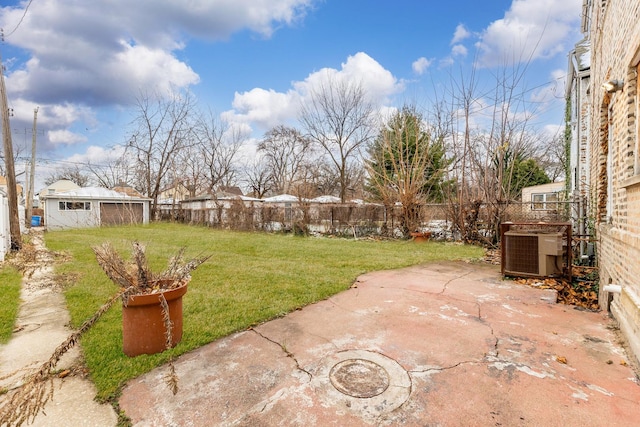 view of yard featuring a patio and central air condition unit