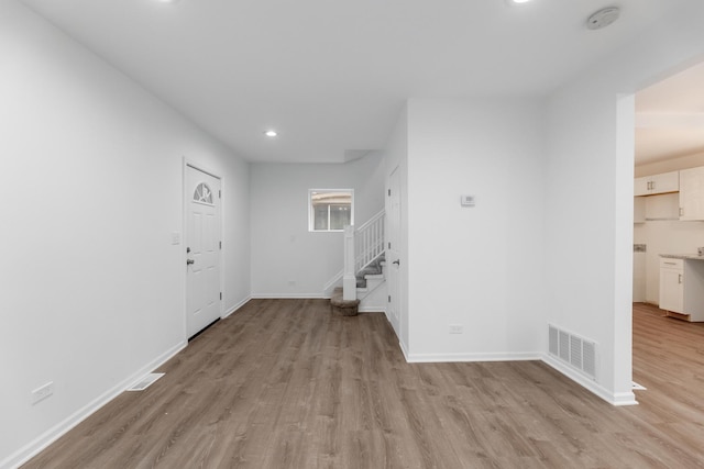 interior space with light hardwood / wood-style floors