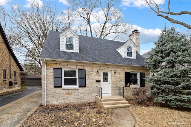 view of new england style home