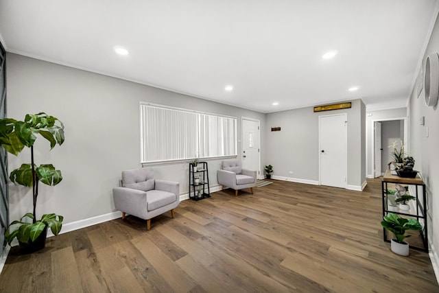 sitting room featuring recessed lighting, baseboards, and wood finished floors