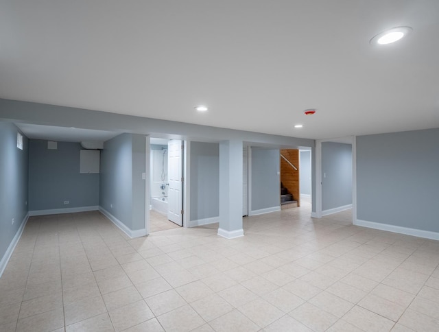 basement with light tile patterned floors