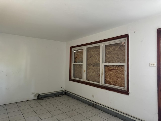 empty room featuring light tile patterned floors