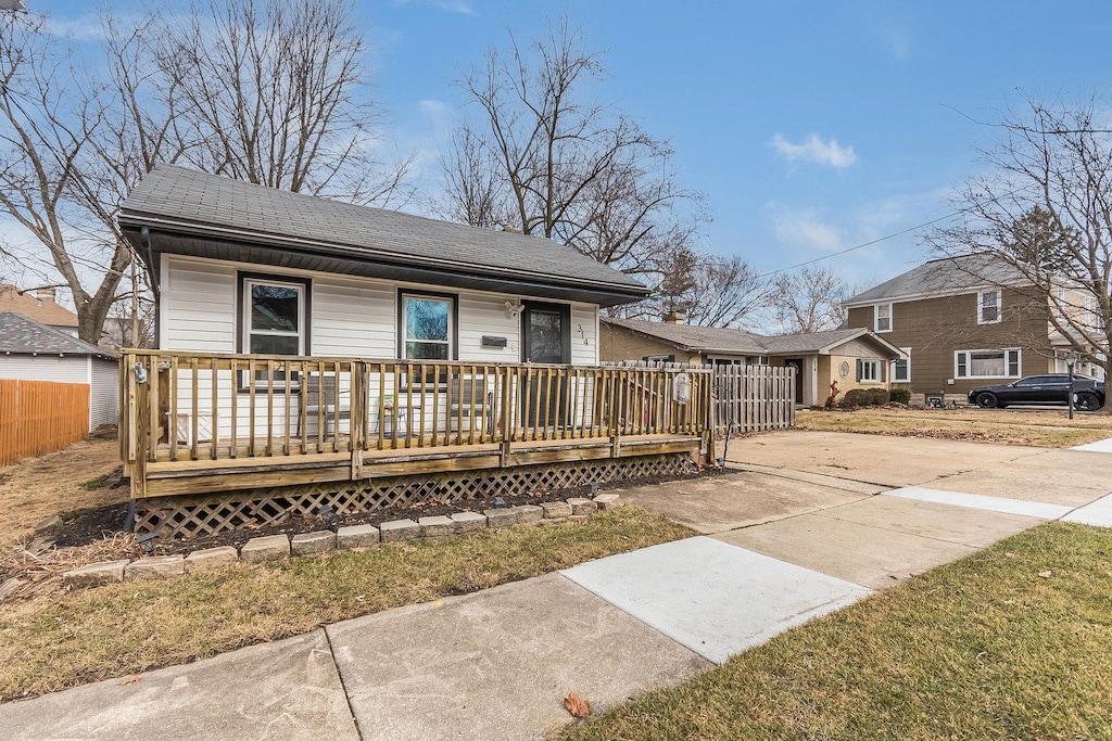 view of front of house with a wooden deck