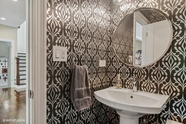 bathroom featuring sink and wood-type flooring