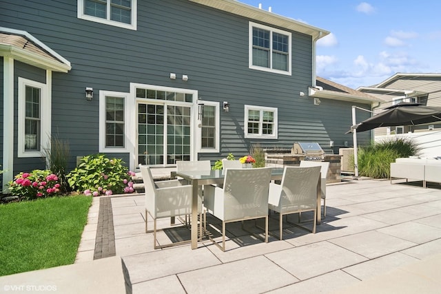 view of patio featuring grilling area and exterior kitchen