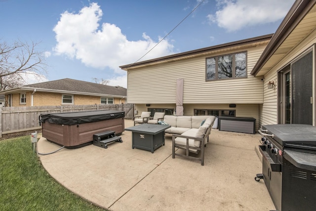 view of patio / terrace featuring an outdoor hangout area and a hot tub