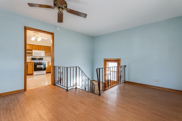 empty room with light wood-type flooring