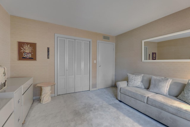 2 Oak Brook Club Dr Unit B209, Oak Brook, IL 60523 - living room featuring light colored carpet and visible vents