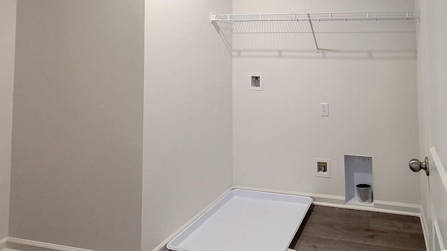 laundry area featuring hardwood / wood-style floors and washer hookup