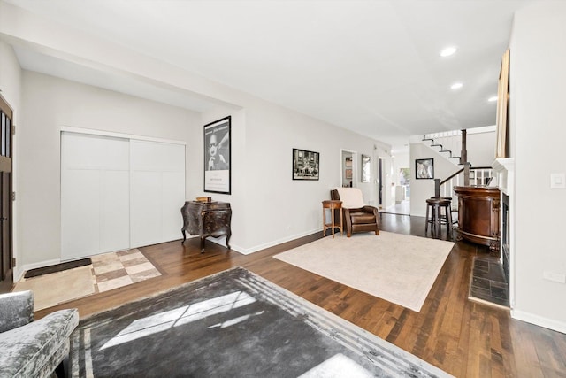 living room with dark wood-type flooring