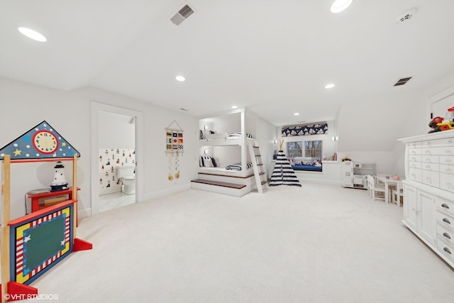 game room with lofted ceiling and light colored carpet