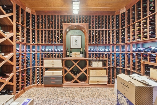 wine area featuring wooden ceiling