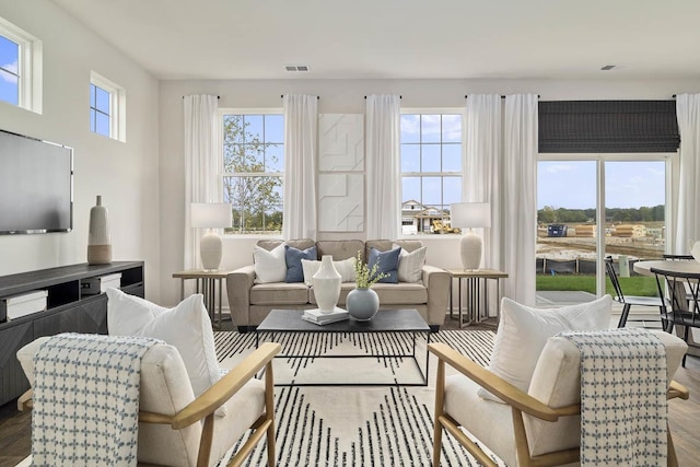 sunroom / solarium featuring plenty of natural light