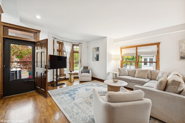 living room with light hardwood / wood-style floors