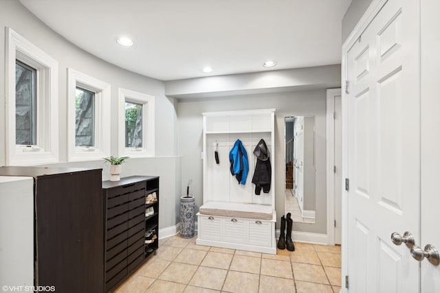 mudroom with light tile patterned flooring