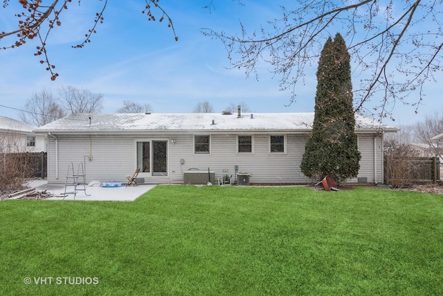 back of property featuring a patio, central AC unit, and a lawn