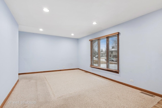 view of carpeted spare room