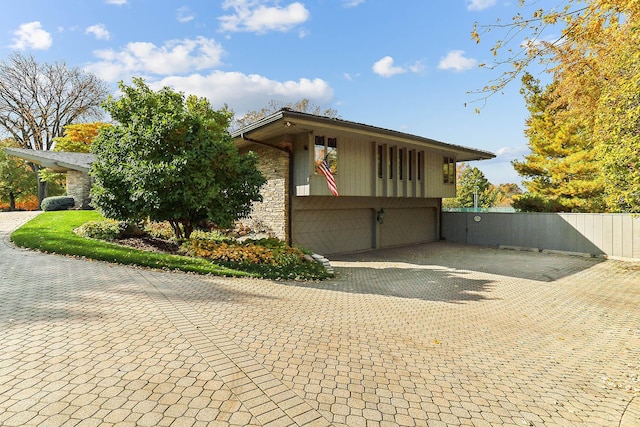 view of home's exterior with a garage