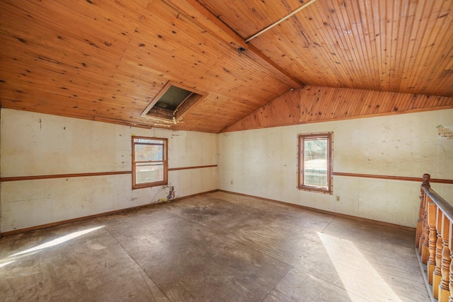 additional living space featuring vaulted ceiling and wood ceiling