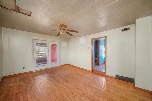 unfurnished room with ceiling fan and light hardwood / wood-style floors