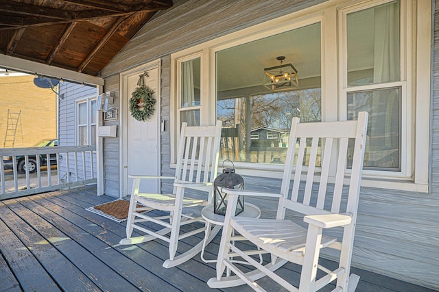 wooden terrace featuring a porch