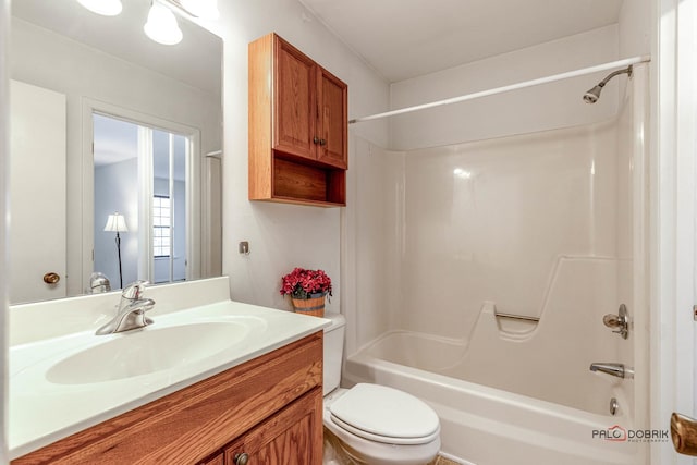 full bathroom with toilet, vanity, and bathtub / shower combination