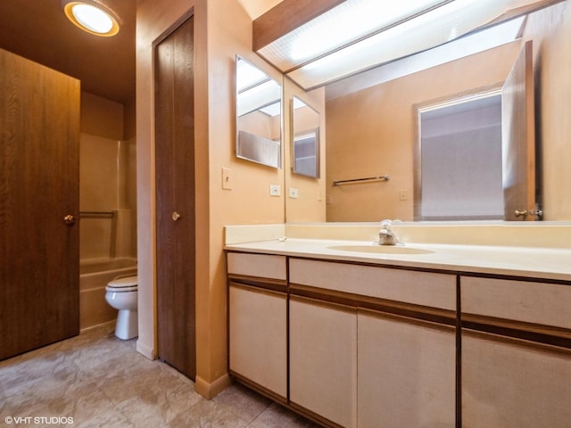 full bathroom featuring vanity, shower / washtub combination, and toilet