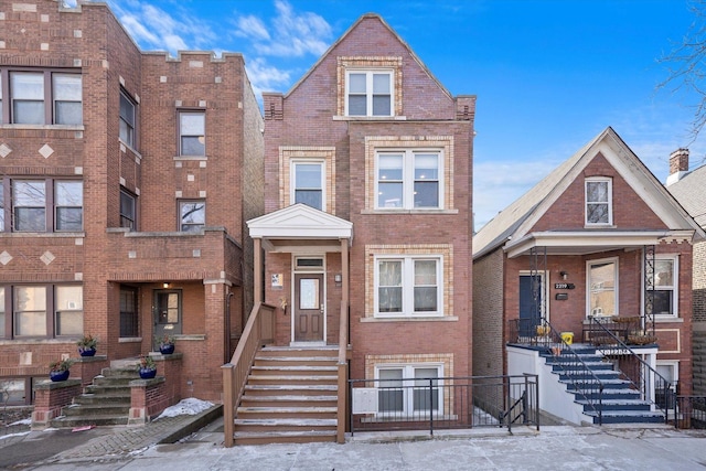 multi unit property featuring brick siding