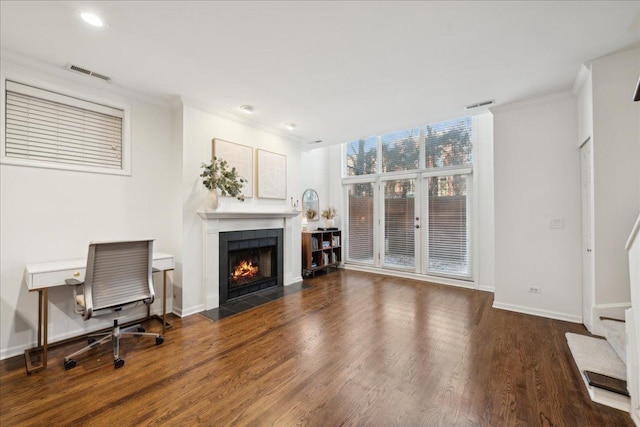 interior space featuring ornamental molding and dark hardwood / wood-style floors