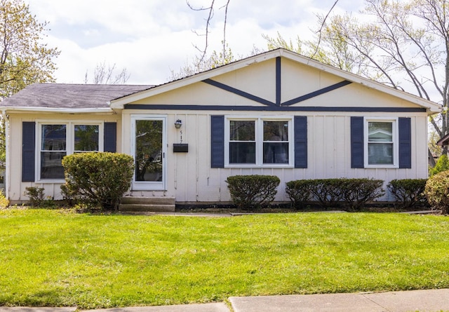 ranch-style house with a front lawn