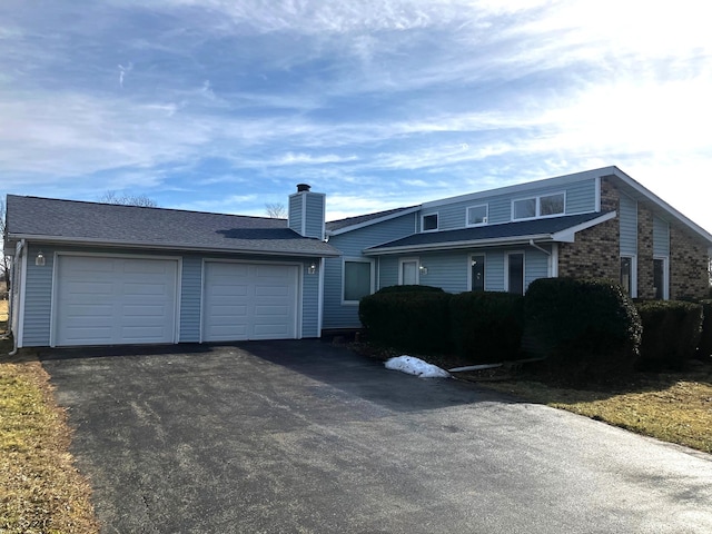 view of front of house with a garage