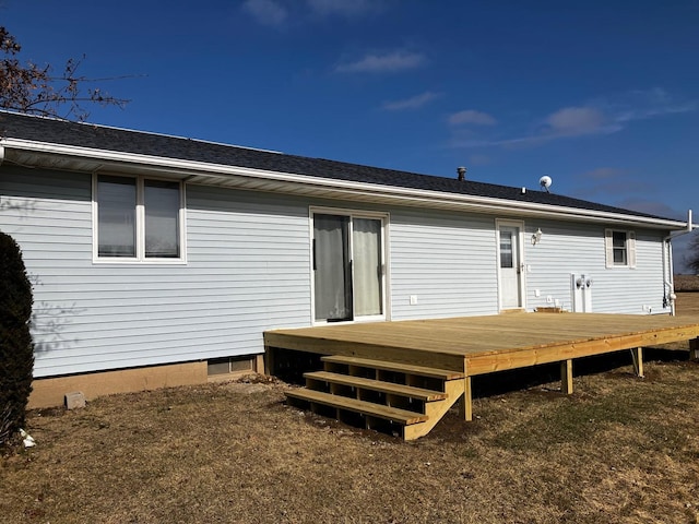 rear view of house with a deck