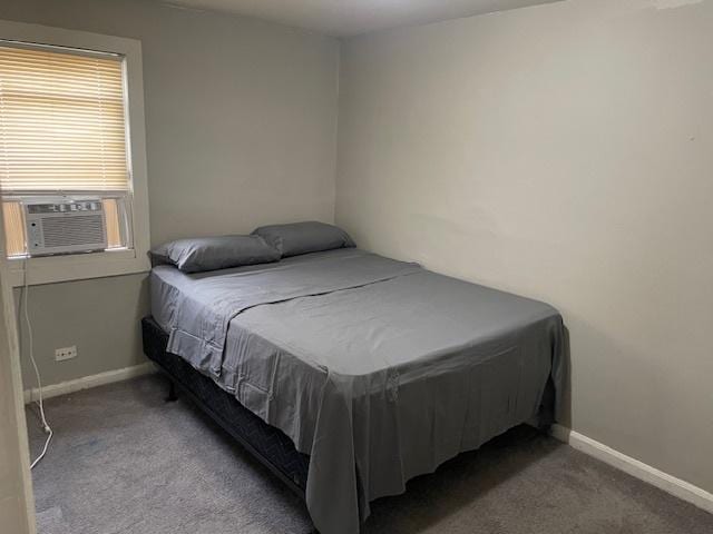 carpeted bedroom featuring cooling unit