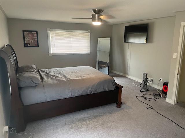 bedroom featuring carpet and ceiling fan