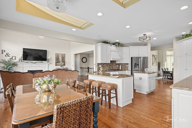 dining room with light hardwood / wood-style flooring